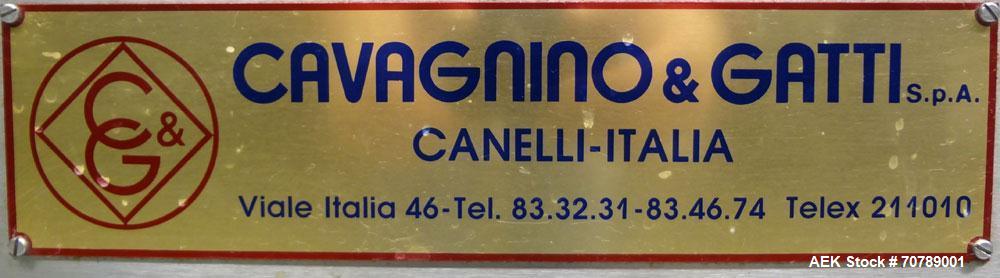 Used Cavagnino & Gatti front back and neck glue labeler. Capable of speeds from 3000 to 8000 bottles per hour. Gluer and Labeler, Series CG84, Model CG84C2/R/7SF C4441, Yr. 1987