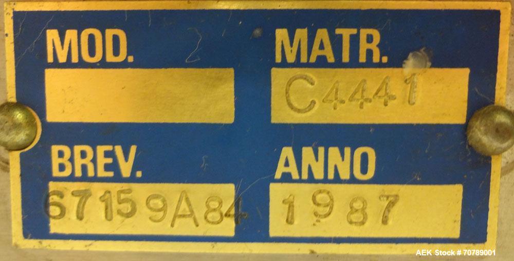 Used Cavagnino & Gatti front back and neck glue labeler. Capable of speeds from 3000 to 8000 bottles per hour. Gluer and Labeler, Series CG84, Model CG84C2/R/7SF C4441, Yr. 1987