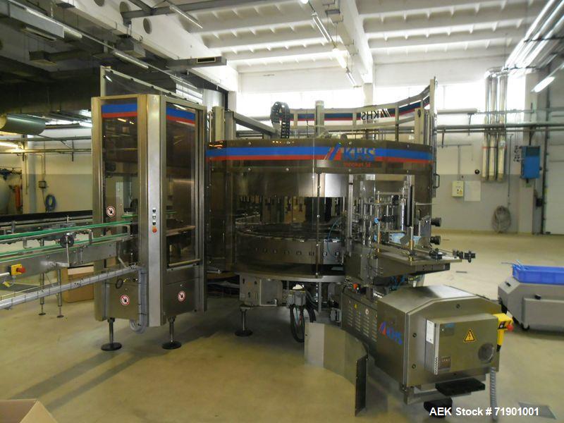 Used KHS AG Front, Back and Neck Glue Labeling Machine. Type Innoket SE 2080/120-48LM GT. Cold glue configuration. Capacity 66000 containers/hour. 73.6” (1888 mm) diameter turn table/carousel. 48 pcs...