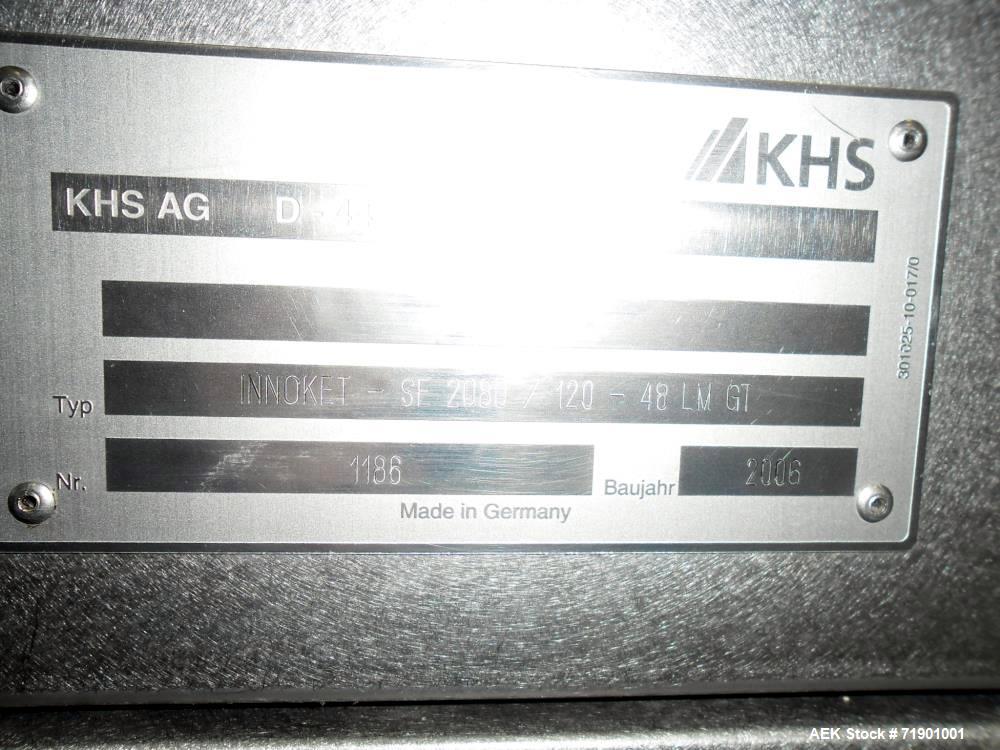 Used KHS AG Front, Back and Neck Glue Labeling Machine. Type Innoket SE 2080/120-48LM GT. Cold glue configuration. Capacity 66000 containers/hour. 73.6” (1888 mm) diameter turn table/carousel. 48 pcs...