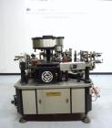 Used Cavagnino & Gatti front back and neck glue labeler. Capable of speeds from 3000 to 8000 bottles per hour. Gluer and Labeler, Series CG84, Model CG84C2/R/7SF C4441, Yr. 1987