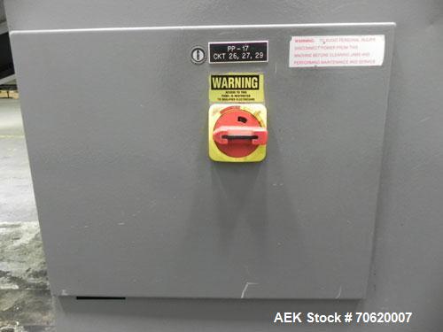 Used Mateer Burt 704 Automatic Roll Through Hot Glue Wraparound Labeler. Capable of speeds up to 600 labels per minute depending on materials and application. Can size range: 1-3/4" to 7-1/4" in diam...