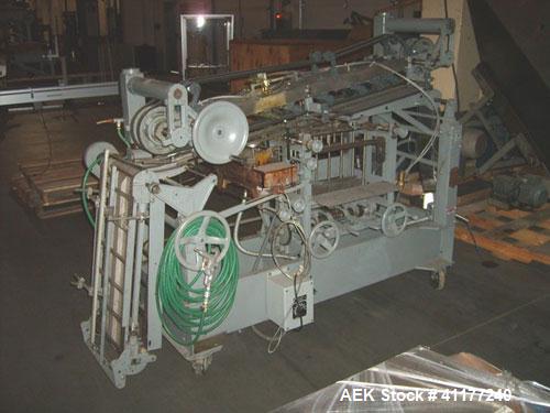 Used NewWay Roll Through Glue Wraparound Labeler, Model E5C5B. Capable of speeds up to 500 cpm. Will label metal cans, jars, plastic bottles or composite cans. Container size range: diameter 1.75" to...