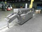 Used Mateer Burt 704 Automatic Roll Through Hot Glue Wraparound Labeler. Capable of speeds up to 600 labels per minute depending on materials and application. Can size range: 1-3/4