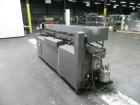 Used Mateer Burt 704 Automatic Roll Through Hot Glue Wraparound Labeler. Capable of speeds up to 600 labels per minute depending on materials and application. Can size range: 1-3/4