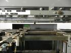 Used Mateer Burt 704 Automatic Roll Through Hot Glue Wraparound Labeler. Capable of speeds up to 600 labels per minute depending on materials and application. Can size range: 1-3/4