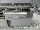 Used Mateer Burt 704 Automatic Roll Through Hot Glue Wraparound Labeler. Capable of speeds up to 600 labels per minute depending on materials and application. Can size range: 1-3/4