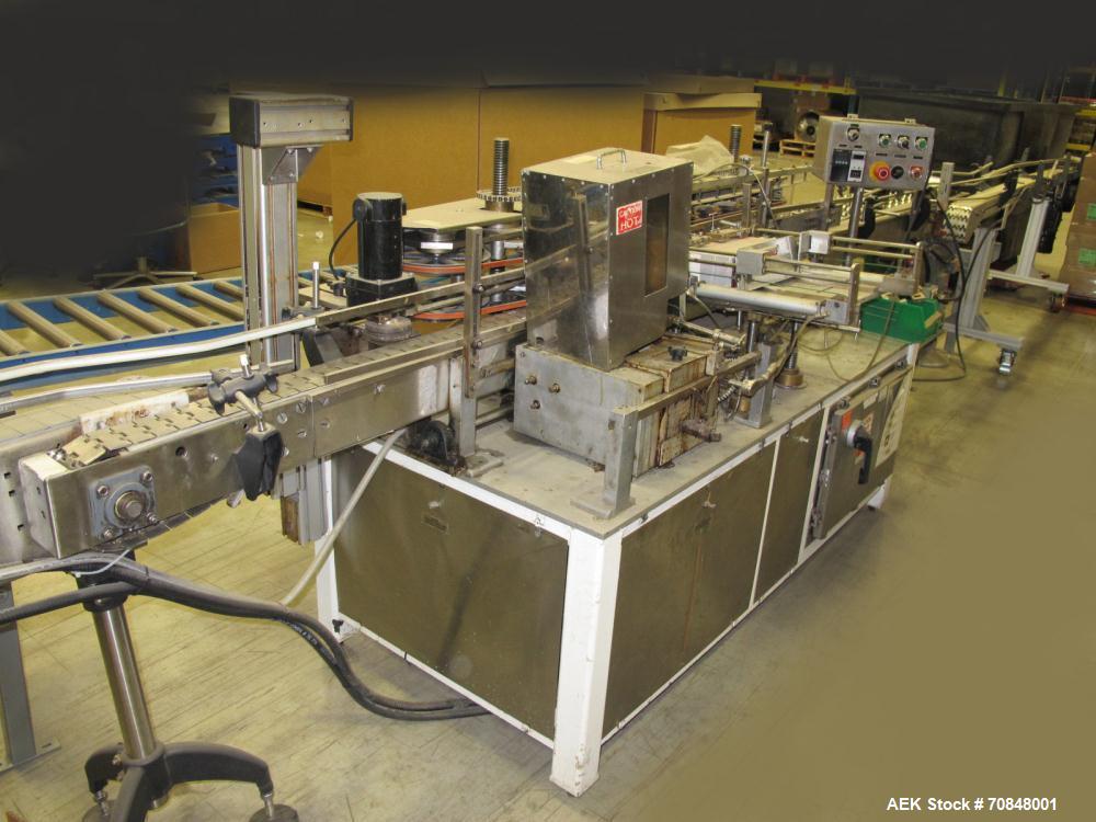 Used Clowe Model 50 Hot Melt Upright Glue Labeler capable of speeds up to 500 containers per minute. Will handle bottles or cans and apply spot or wraparound labels. Container size range: diameter 2"...