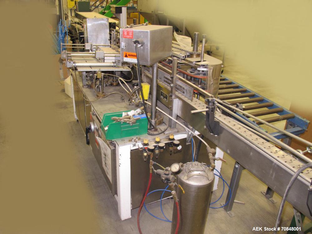 Used Clowe Model 50 Hot Melt Upright Glue Labeler capable of speeds up to 500 containers per minute. Will handle bottles or cans and apply spot or wraparound labels. Container size range: diameter 2"...