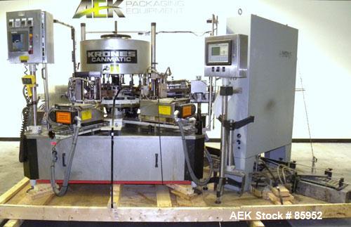 Used Krones Canmatic Rotary Hot Glue Wraparound Labeler. 18 hd Capable of running up to 600 cpm. Container size range: 50-110mm diameter, 50-250mm or 150-350mm height. 18 head unit set on 126mm pitch...