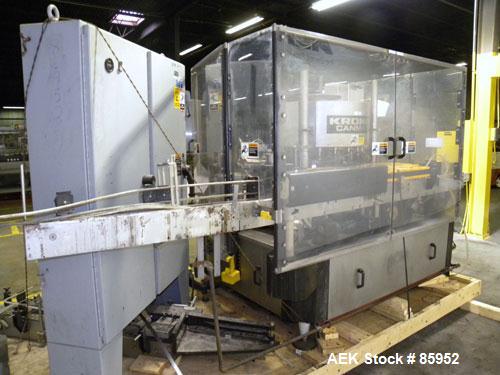Used Krones Canmatic Rotary Hot Glue Wraparound Labeler. 18 hd Capable of running up to 600 cpm. Container size range: 50-110mm diameter, 50-250mm or 150-350mm height. 18 head unit set on 126mm pitch...