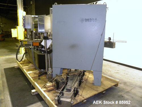 Used Krones Canmatic Rotary Hot Glue Wraparound Labeler. 18 hd Capable of running up to 600 cpm. Container size range: 50-110mm diameter, 50-250mm or 150-350mm height. 18 head unit set on 126mm pitch...
