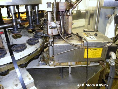 Used Krones Canmatic Rotary Hot Glue Wraparound Labeler. 18 hd Capable of running up to 600 cpm. Container size range: 50-110mm diameter, 50-250mm or 150-350mm height. 18 head unit set on 126mm pitch...