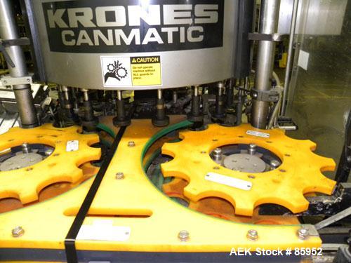 Used Krones Canmatic Rotary Hot Glue Wraparound Labeler. 18 hd Capable of running up to 600 cpm. Container size range: 50-110mm diameter, 50-250mm or 150-350mm height. 18 head unit set on 126mm pitch...