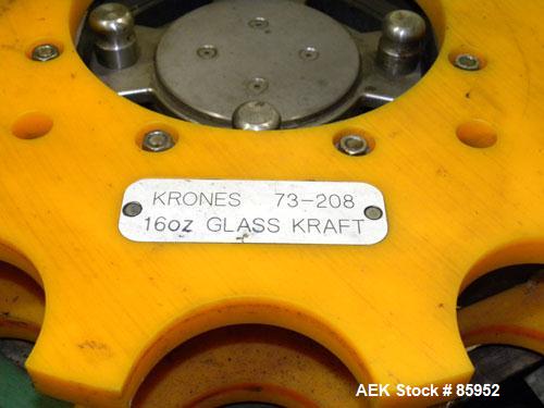 Used Krones Canmatic Rotary Hot Glue Wraparound Labeler. 18 hd Capable of running up to 600 cpm. Container size range: 50-110mm diameter, 50-250mm or 150-350mm height. 18 head unit set on 126mm pitch...
