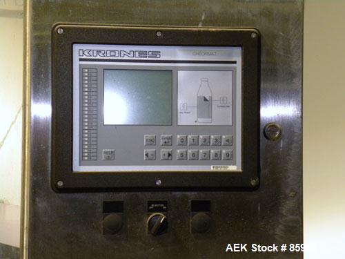 Used Krones Canmatic Rotary Hot Glue Wraparound Labeler. 18 hd Capable of running up to 600 cpm. Container size range: 50-110mm diameter, 50-250mm or 150-350mm height. 18 head unit set on 126mm pitch...