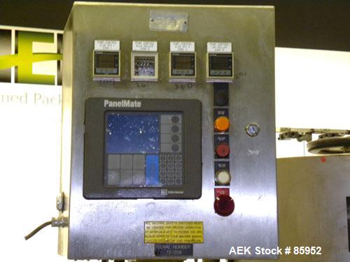 Used Krones Canmatic Rotary Hot Glue Wraparound Labeler. 18 hd Capable of running up to 600 cpm. Container size range: 50-110mm diameter, 50-250mm or 150-350mm height. 18 head unit set on 126mm pitch...