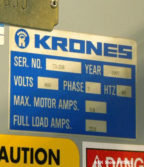 Used Krones Canmatic Rotary Hot Glue Wraparound Labeler. 18 hd Capable of running up to 600 cpm. Container size range: 50-110mm diameter, 50-250mm or 150-350mm height. 18 head unit set on 126mm pitch...