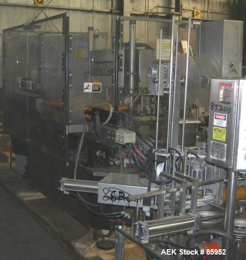 Used Krones Canmatic Rotary Hot Glue Wraparound Labeler. 18 hd Capable of running up to 600 cpm. Container size range: 50-110mm diameter, 50-250mm or 150-350mm height. 18 head unit set on 126mm pitch...