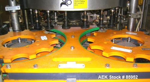 Used Krones Canmatic Rotary Hot Glue Wraparound Labeler. 18 hd Capable of running up to 600 cpm. Container size range: 50-110mm diameter, 50-250mm or 150-350mm height. 18 head unit set on 126mm pitch...
