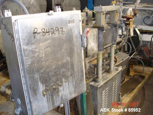 Used Krones Canmatic Rotary Hot Glue Wraparound Labeler. 18 hd Capable of running up to 600 cpm. Container size range: 50-110mm diameter, 50-250mm or 150-350mm height. 18 head unit set on 126mm pitch...