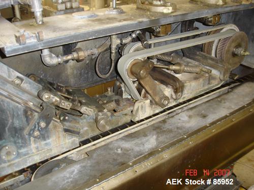 Used Krones Canmatic Rotary Hot Glue Wraparound Labeler. 18 hd Capable of running up to 600 cpm. Container size range: 50-110mm diameter, 50-250mm or 150-350mm height. 18 head unit set on 126mm pitch...