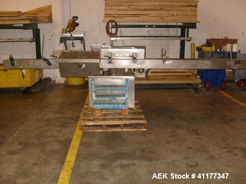 Used Krones Inline Wraparound Cold Glue Labeler, Model Rotina III. Capable of speeds over 200 BPM. Maximum container diameter up to 4". Minimum label size 2" high x 3" long. Complete with glue pump. ...