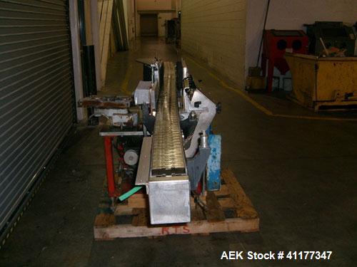 Used Krones Inline Wraparound Cold Glue Labeler, Model Rotina III. Capable of speeds over 200 BPM. Maximum container diameter up to 4". Minimum label size 2" high x 3" long. Complete with glue pump. ...
