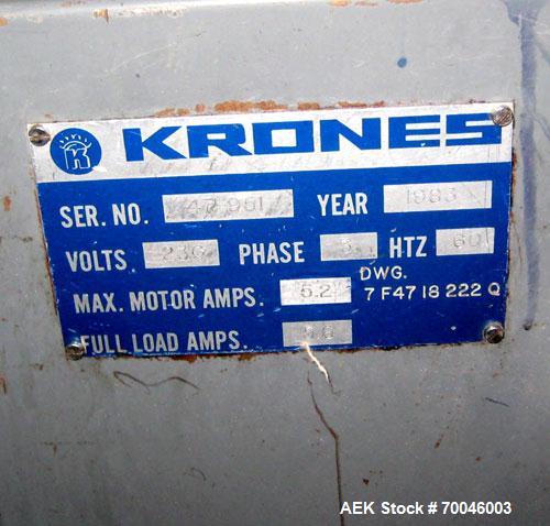 Used Krones Rotina I Wraparound Cold Glue Labeler. Cable of speeds up to 80 bottles per minute on wraparound or 100 bottles per minute on spot labels. Has a label size range: length 2" to 14", width ...