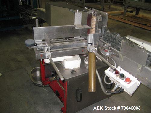 Used Krones Rotina I Wraparound Cold Glue Labeler. Cable of speeds up to 80 bottles per minute on wraparound or 100 bottles per minute on spot labels. Has a label size range: length 2" to 14", width ...