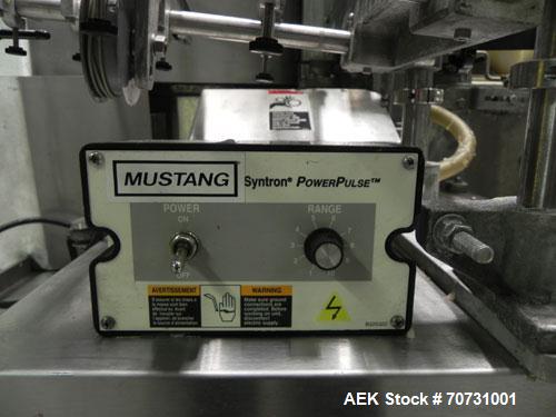 Used New Jersey Machine Mustang II Automatic Glue Labeler capable of speeds up to 250 labels per minute. Has a label size range: length 2-1/2" to 14-1/2", height 1" to 5-1/2". Container size range: d...