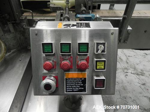 Used New Jersey Machine Mustang II Automatic Glue Labeler capable of speeds up to 250 labels per minute. Has a label size range: length 2-1/2" to 14-1/2", height 1" to 5-1/2". Container size range: d...