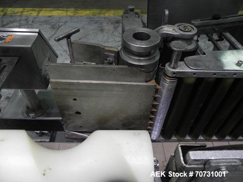 Used New Jersey Machine Mustang II Automatic Glue Labeler capable of speeds up to 250 labels per minute. Has a label size range: length 2-1/2" to 14-1/2", height 1" to 5-1/2". Container size range: d...