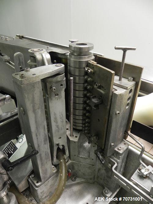 Used New Jersey Machine Mustang II Automatic Glue Labeler capable of speeds up to 250 labels per minute. Has a label size range: length 2-1/2" to 14-1/2", height 1" to 5-1/2". Container size range: d...