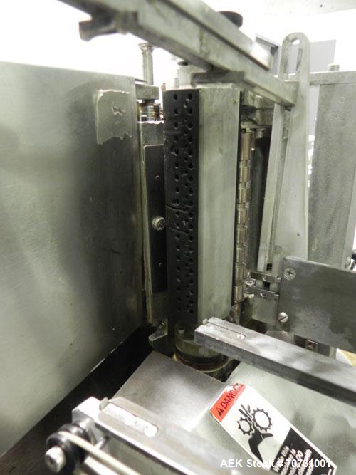 Used New Jersey Machine Mustang II Automatic Glue Labeler capable of speeds up to 250 labels per minute. Has a label size range: length 2-1/2" to 14-1/2", height 1" to 5-1/2". Container size range: d...