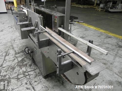 Used New Jersey Machine Mustang II Automatic Glue Labeler capable of speeds up to 250 labels per minute. Has a label size range: length 2-1/2" to 14-1/2", height 1" to 5-1/2". Container size range: d...