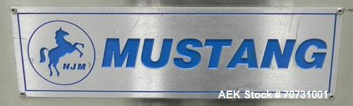 Used New Jersey Machine Mustang II Automatic Glue Labeler capable of speeds up to 250 labels per minute. Has a label size range: length 2-1/2" to 14-1/2", height 1" to 5-1/2". Container size range: d...