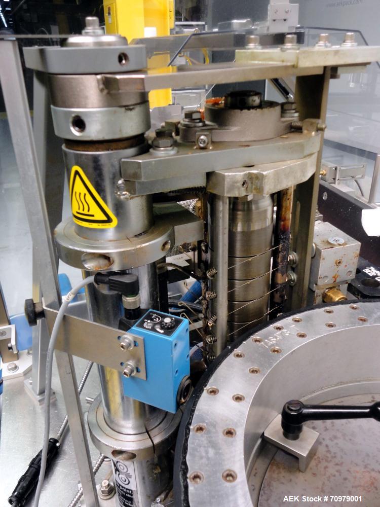 Used Trine Model 4500CE Roll Fed Wraparound Hot Melt Labeler