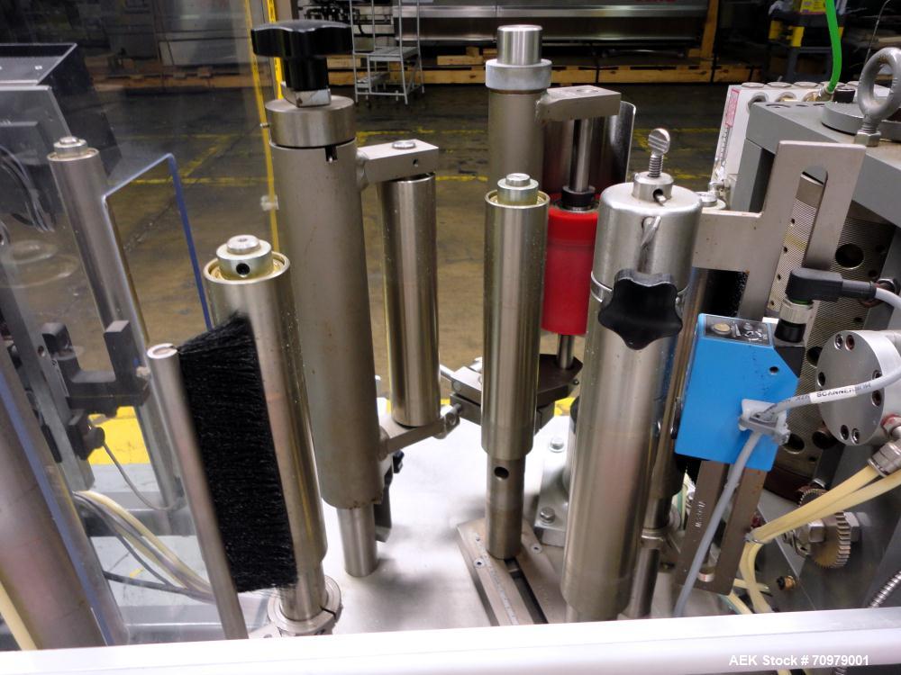 Used Trine Model 4500CE Roll Fed Wraparound Hot Melt Labeler
