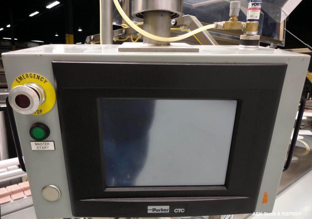 Used Trine Model 4500CE Roll Fed Wraparound Hot Melt Labeler