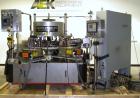 Used Krones Canmatic Rotary Hot Glue Wraparound Labeler. 18 hd Capable of running up to 600 cpm. Container size range: 50-110mm diameter, 50-250mm or 150-350mm height. 18 head unit set on 126mm pitch...