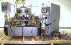Used Krones Canmatic Rotary Hot Glue Wraparound Labeler. 18 hd Capable of running up to 600 cpm. Container size range: 50-110mm diameter, 50-250mm or 150-350mm height. 18 head unit set on 126mm pitch...