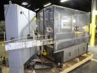 Used Krones Canmatic Rotary Hot Glue Wraparound Labeler. 18 hd Capable of running up to 600 cpm. Container size range: 50-110mm diameter, 50-250mm or 150-350mm height. 18 head unit set on 126mm pitch...