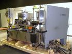 Used Krones Canmatic Rotary Hot Glue Wraparound Labeler. 18 hd Capable of running up to 600 cpm. Container size range: 50-110mm diameter, 50-250mm or 150-350mm height. 18 head unit set on 126mm pitch...
