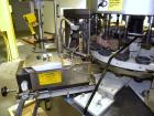 Used Krones Canmatic Rotary Hot Glue Wraparound Labeler. 18 hd Capable of running up to 600 cpm. Container size range: 50-110mm diameter, 50-250mm or 150-350mm height. 18 head unit set on 126mm pitch...