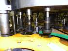 Used Krones Canmatic Rotary Hot Glue Wraparound Labeler. 18 hd Capable of running up to 600 cpm. Container size range: 50-110mm diameter, 50-250mm or 150-350mm height. 18 head unit set on 126mm pitch...