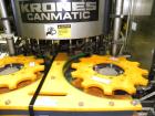 Used Krones Canmatic Rotary Hot Glue Wraparound Labeler. 18 hd Capable of running up to 600 cpm. Container size range: 50-110mm diameter, 50-250mm or 150-350mm height. 18 head unit set on 126mm pitch...