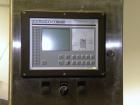 Used Krones Canmatic Rotary Hot Glue Wraparound Labeler. 18 hd Capable of running up to 600 cpm. Container size range: 50-110mm diameter, 50-250mm or 150-350mm height. 18 head unit set on 126mm pitch...