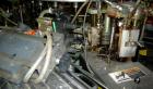 Used Krones Canmatic Rotary Hot Glue Wraparound Labeler. 18 hd Capable of running up to 600 cpm. Container size range: 50-110mm diameter, 50-250mm or 150-350mm height. 18 head unit set on 126mm pitch...