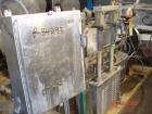 Used Krones Canmatic Rotary Hot Glue Wraparound Labeler. 18 hd Capable of running up to 600 cpm. Container size range: 50-110mm diameter, 50-250mm or 150-350mm height. 18 head unit set on 126mm pitch...